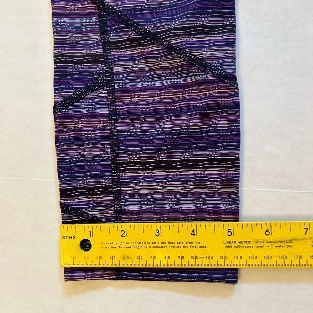 Lululemon striped purple legging w/back zip pocket & 2‎ side pockets Sz-6. Z19